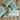 Kissenhülle Boho Style mintgrün offwhite mit Quasten 30 x 50 cm